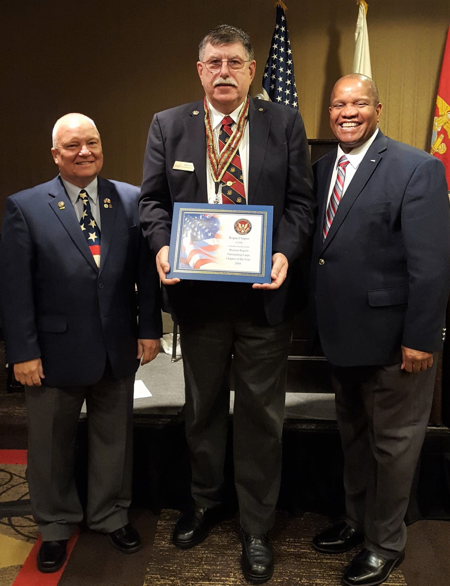 Terry accepting Western Region Large Chapter of the year for 2016