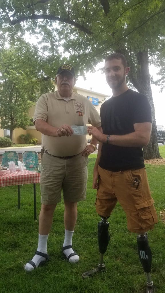 Jed received a check from the NCOA Rogue Chapter #1260