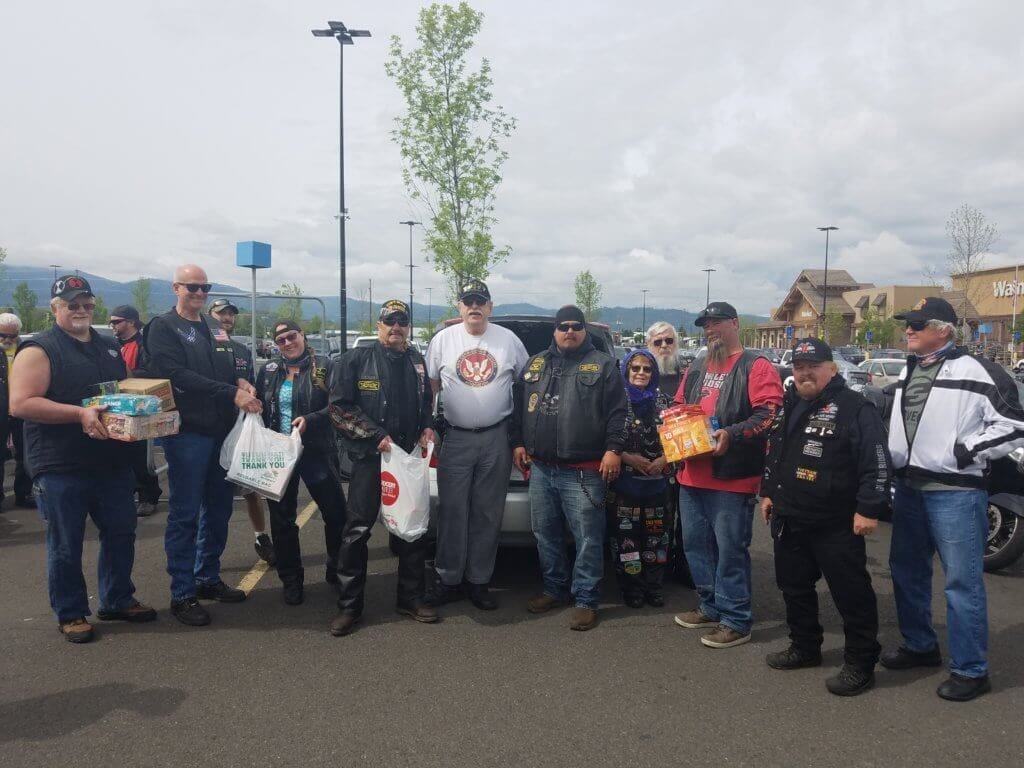 Motor Cycle group donating care package items 4-25-20