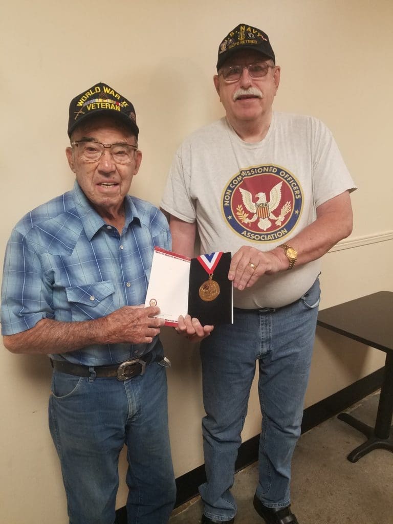 Rogue Chapter Chairman presented an NCOA World War Two Medallion to Army veteran Harry Howard at a recent veteran breakfast gathering.