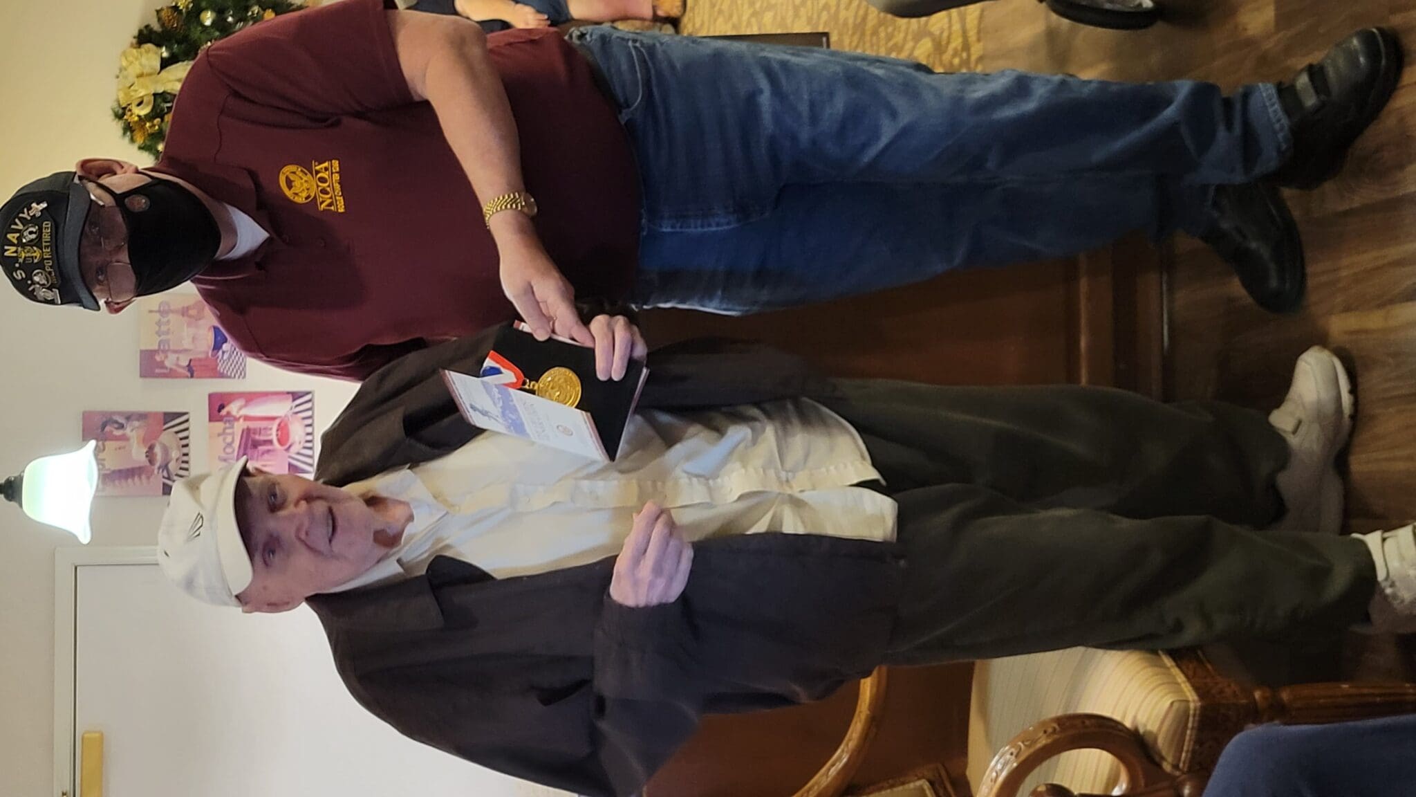 Army veteran Elie Morrell receives WW2 medallion from Chairman Haines