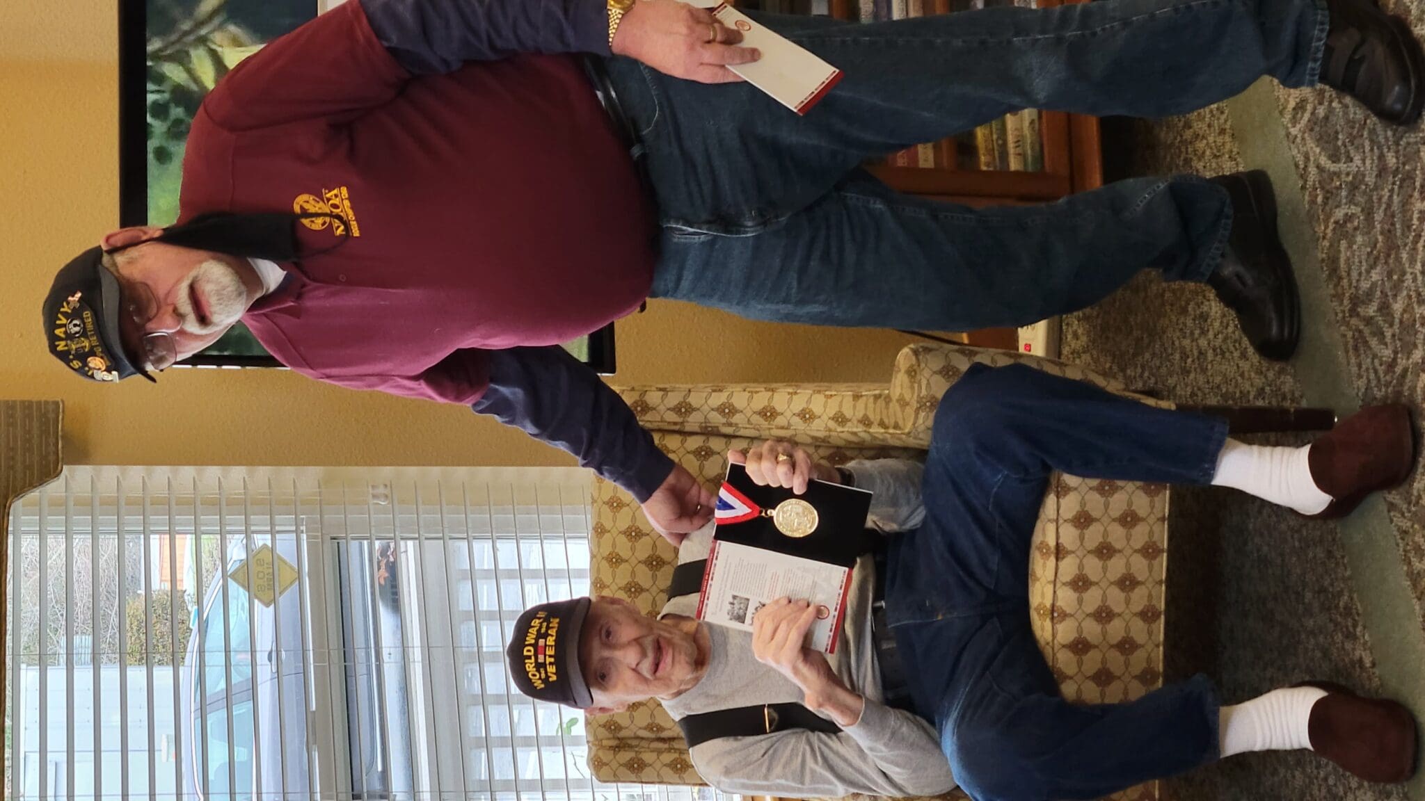 Army veteran Jay Hayes receives WW2 medallion from Chairman Haines