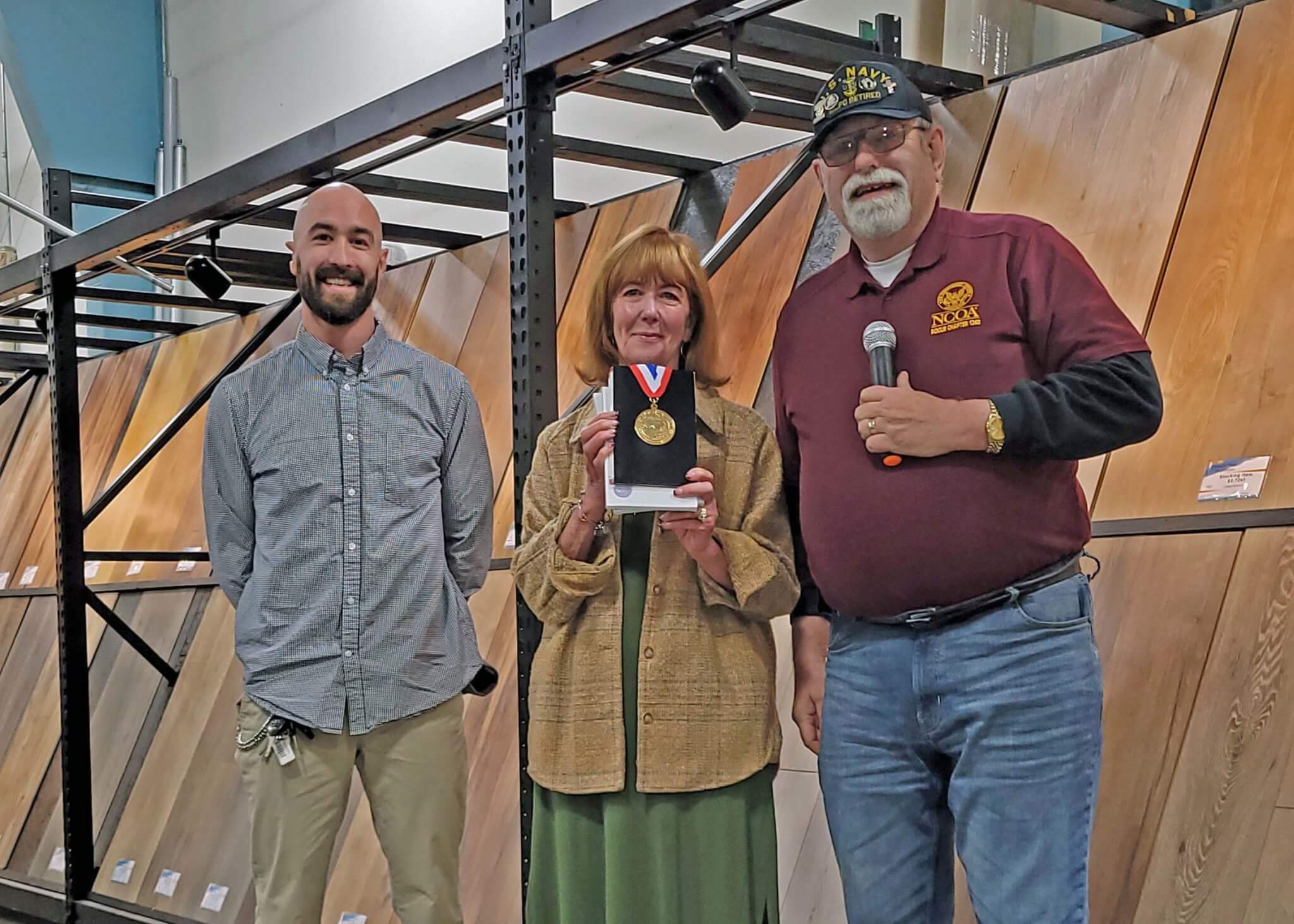 Chairman Haines presents WW2 Medallions to Connie Levestrue, daughter of Marine veteran Chester Nunn & Chester's brothers Maurice & Robert Nunn, also Marines.